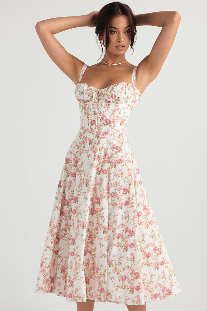 Elegantes Bustierkleid mit lebhaftem Blumenmuster, figurbetonender Schnitt, perfekt für Frühlingsanlässe.