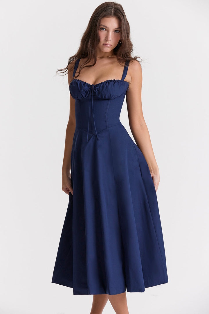 Elegantes Bustierkleid mit lebhaftem Blumenmuster, figurbetonender Schnitt, perfekt für Frühlingsanlässe.