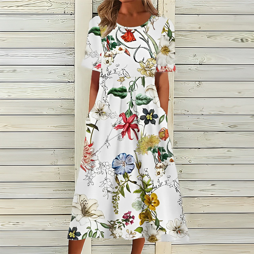 "Elegantes Damen Midi-Kleid in Weiß mit Blumenmuster, ideal für Sommer, betont feminine Silhouette."