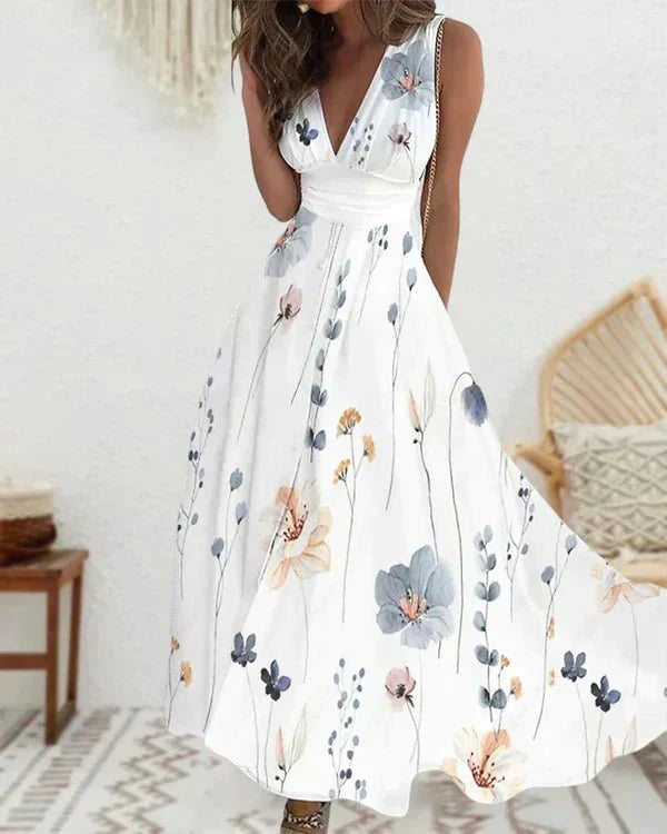 "Elegantes, leichtes Blumen V-Ausschnitt Kleid aus luftigen Materialien, perfekt für romantische und sonnige Anlässe."