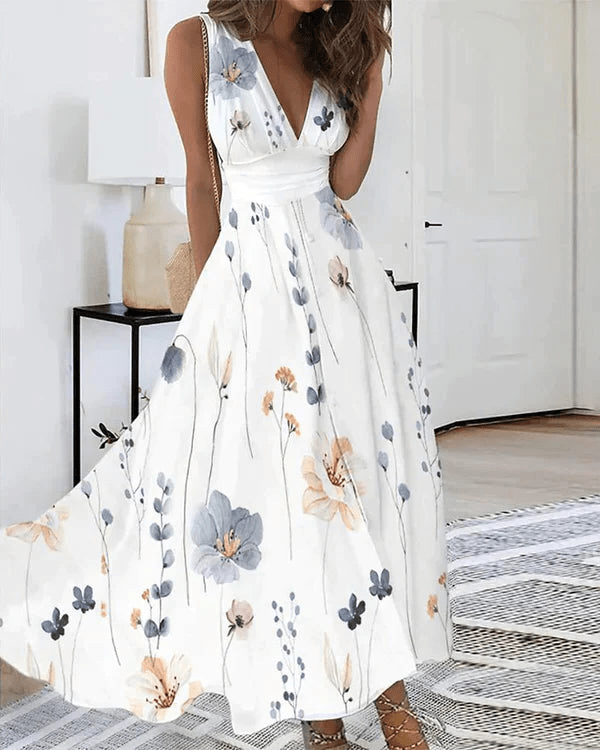 "Elegantes, leichtes Blumen V-Ausschnitt Kleid aus luftigen Materialien, perfekt für romantische und sonnige Anlässe."