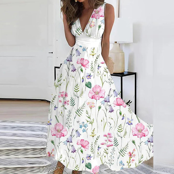 "Elegantes, leichtes Blumen V-Ausschnitt Kleid aus luftigen Materialien, perfekt für romantische und sonnige Anlässe."