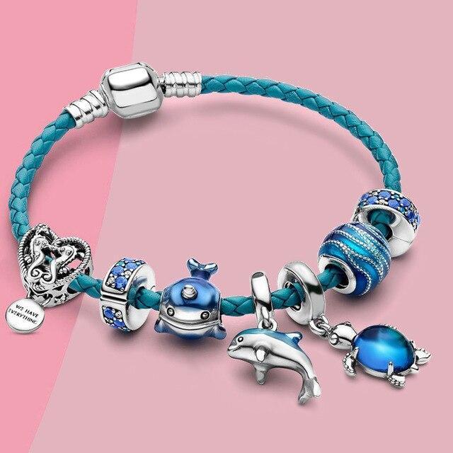 "Elegantes Ocean Breeze Armband aus Leder und Silber mit maritimen Motiven, ideal für stilvolle Frauenaccessoires."
