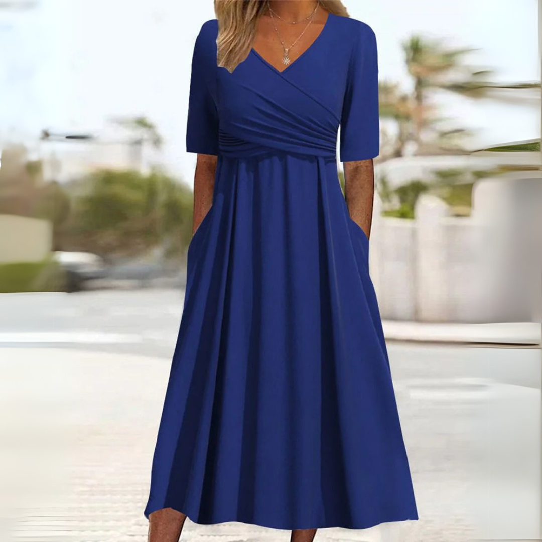 Elegantes Wickelkleid mit kurzen Ärmeln, knielang, ideal für warme Tage, in Grau, Grün, Hellblau und Marineblau.
