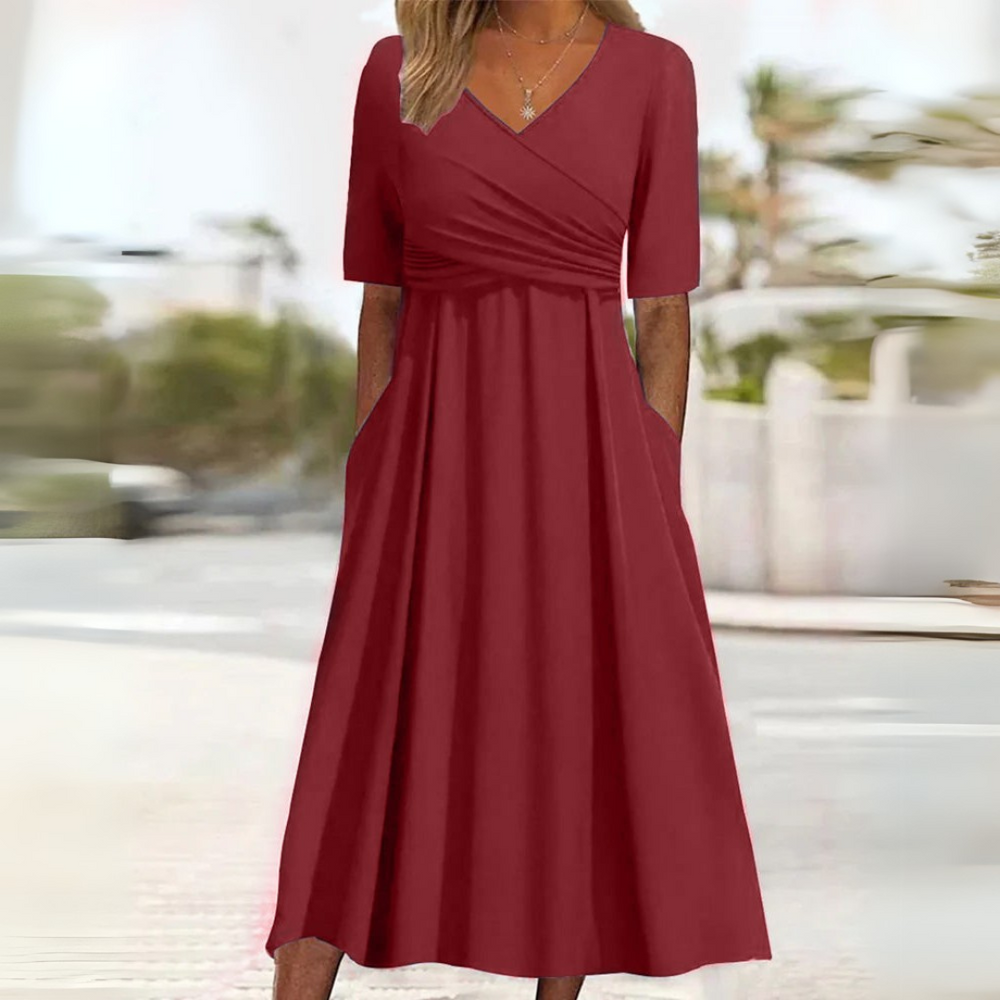 Elegantes Wickelkleid mit kurzen Ärmeln, knielang, ideal für warme Tage, in Grau, Grün, Hellblau und Marineblau.