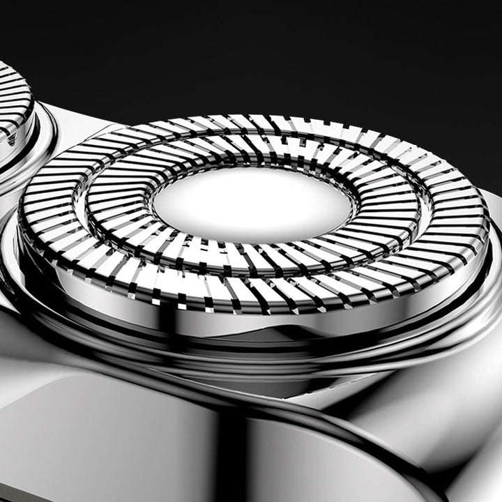 "Elektrorasierer, grau-orange, kompakt, mit LED-Anzeige und magnetischer USB-C-Aufladung für nasse/trockene Rasuren."