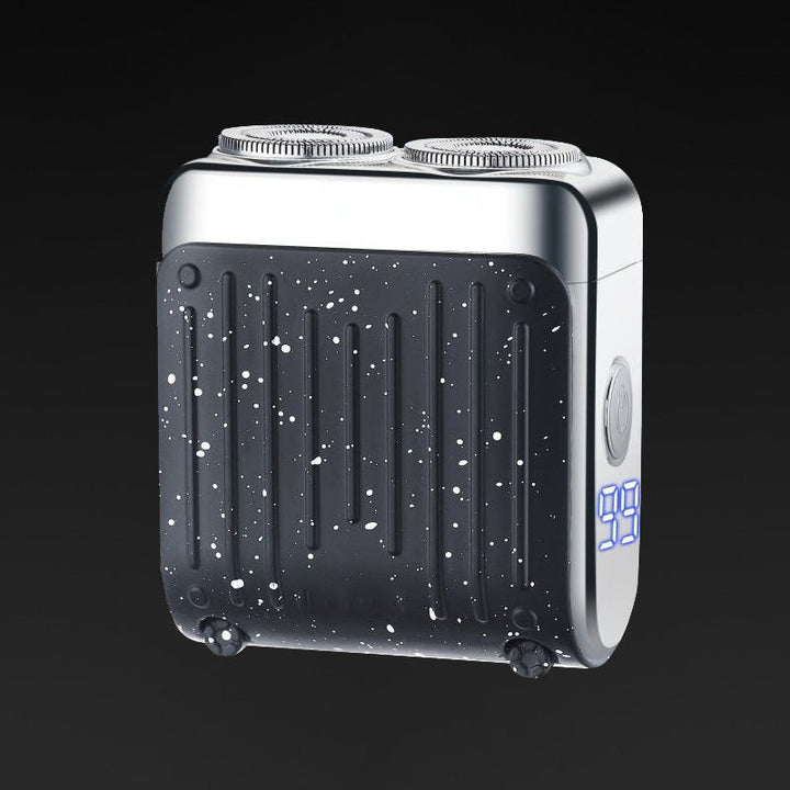 "Elektrorasierer, grau-orange, kompakt, mit LED-Anzeige und magnetischer USB-C-Aufladung für nasse/trockene Rasuren."