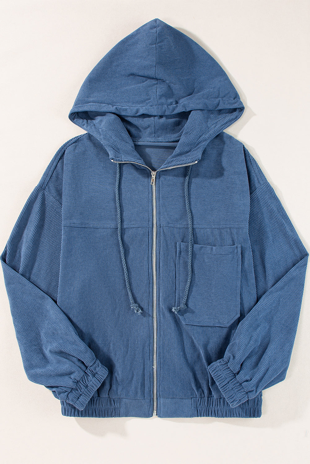 Blaugrüne Cordjacke mit Kapuze und Kordelzug