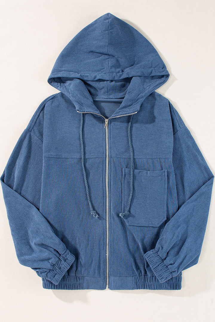 Blaugrüne Cordjacke mit Kapuze und Kordelzug