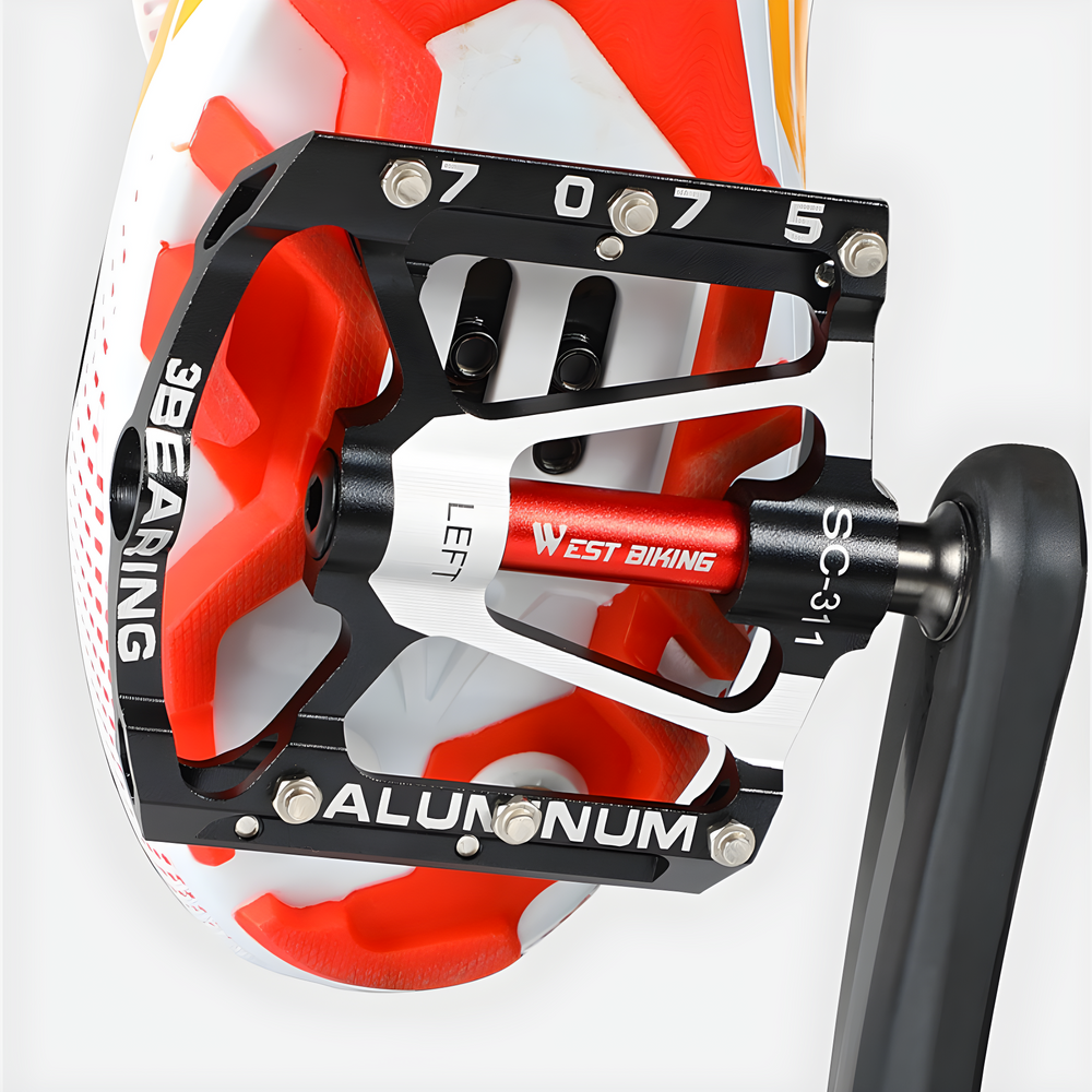 Schwarzes Aluminium-Fahrradpedal mit rotem Akzent, rutschfest, für Mountainbikes.