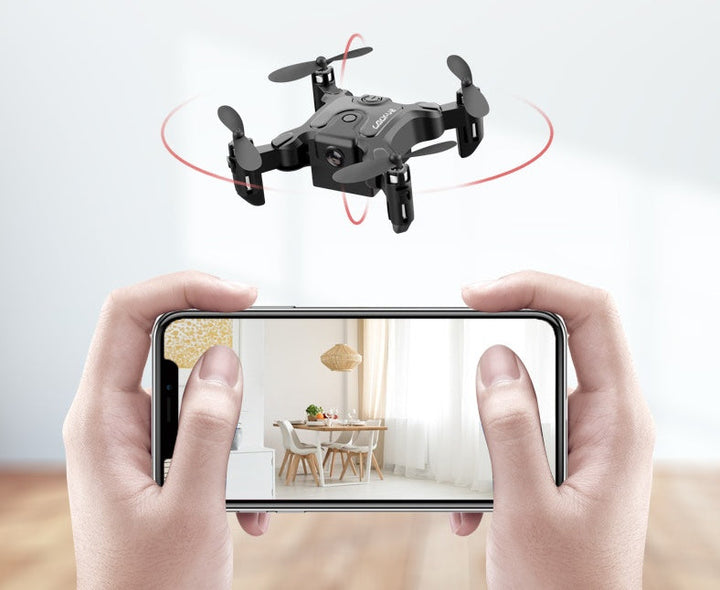 "Faltbare Mini Drohne 4K in Flugposition, HD Kamera für beeindruckende Luftaufnahmen, kompakt und perfekt für Reisen."