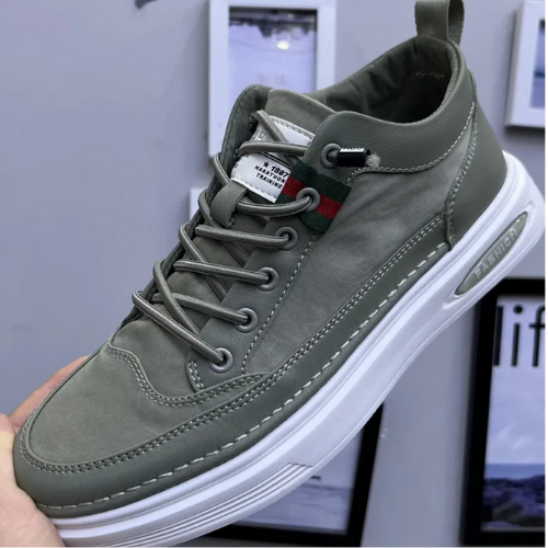 "Graue orthopädische Herrenschuhe, seitliche Ansicht, stilvoll und komfortabel, perfekt für Alltag und formelle Anlässe."