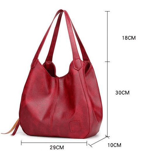 "Große stilvolle Ledertasche in Braun, Vintage-Design, ideal für Alltag und Reisen, mit sicheren Reißverschlussdetails."