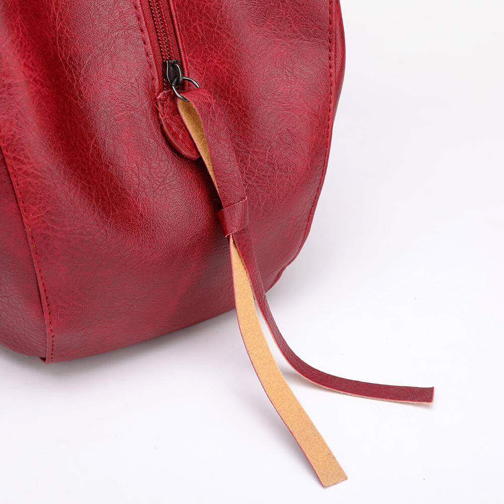 "Große stilvolle Ledertasche in Braun, Vintage-Design, ideal für Alltag und Reisen, mit sicheren Reißverschlussdetails."