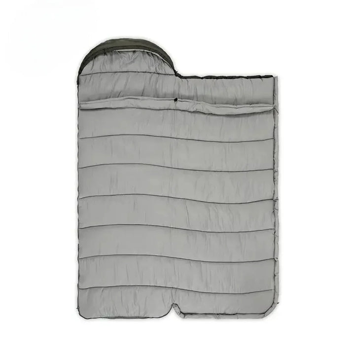 "Grüner ultraleichter Outdoor-Schlafsack, ergonomisches Design, optimal für kalte Nächte, isoliert und leicht tragbar."