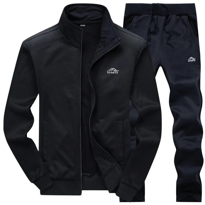 Herren Jogging Set in Grau, funktional & robust, mit Wind- & Wasserschutz, ideal für Outdoor-Training, Jacke & Hose.