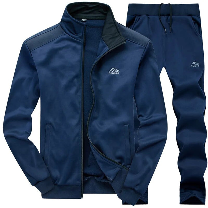 Herren Jogging Set in Grau, funktional & robust, mit Wind- & Wasserschutz, ideal für Outdoor-Training, Jacke & Hose.
