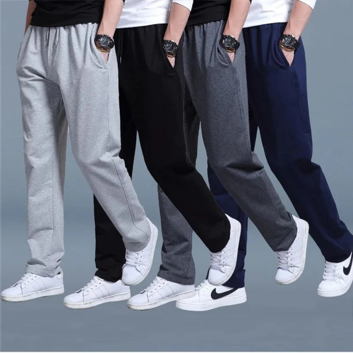 "Herren Jogginghose aus Baumwolle in Dunkelgrau mit elastischem Bund und Seitentaschen, ideal für Komfort und Stil."