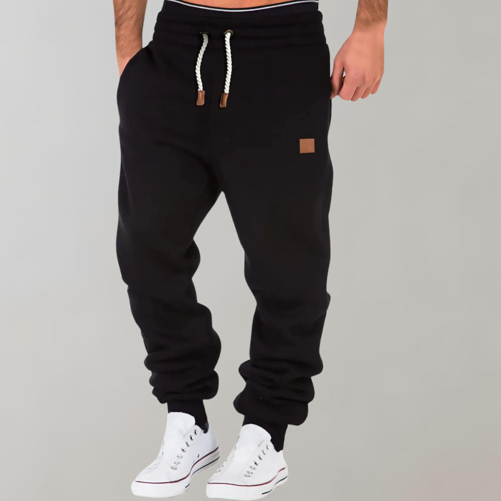 "Herren Jogginghose, modern und bequem, dunkelgrau, schmaler Schnitt, elastischer Bund, Taschen, ideal für Sport und Freizeit