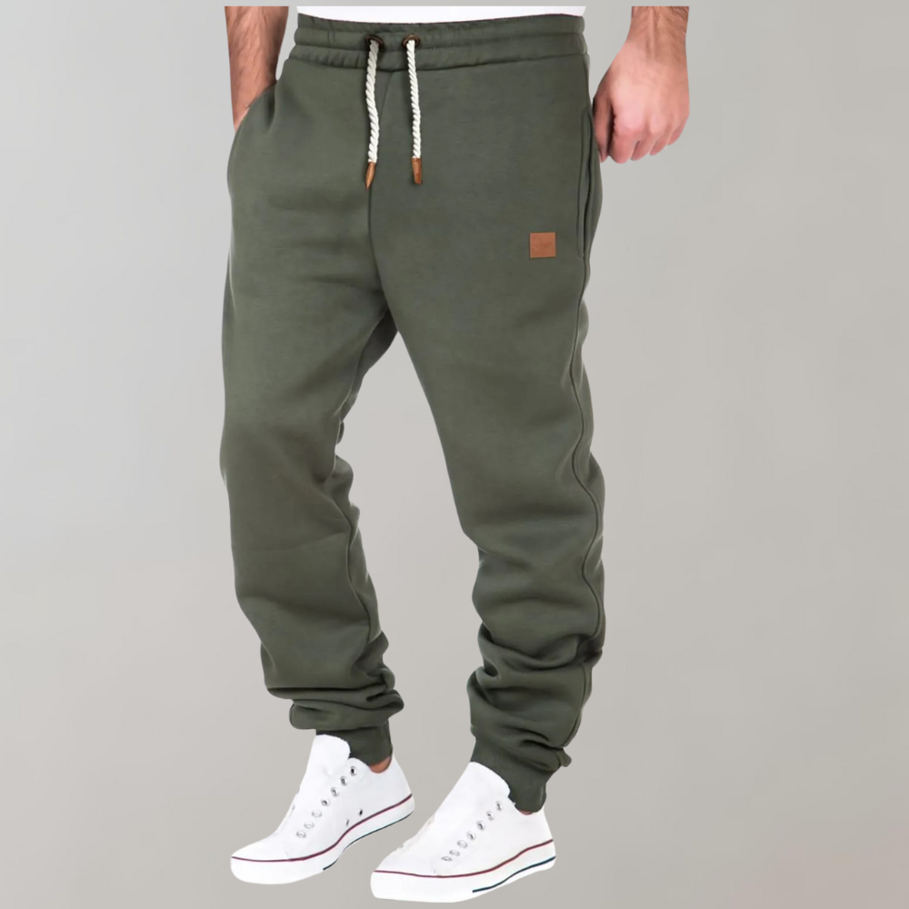 "Herren Jogginghose, modern und bequem, dunkelgrau, schmaler Schnitt, elastischer Bund, Taschen, ideal für Sport und Freizeit