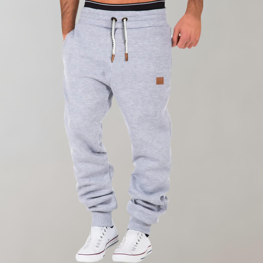 "Herren Jogginghose, modern und bequem, dunkelgrau, schmaler Schnitt, elastischer Bund, Taschen, ideal für Sport und Freizeit