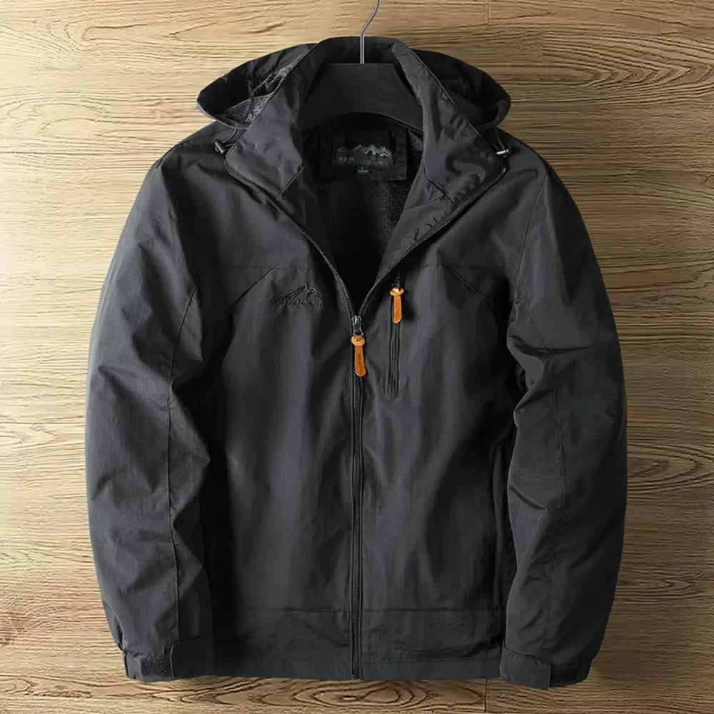 "Herren Outdoorjacke, wasserdicht, atmungsaktiv, in Blau, stilvolles Design, ideal für Wandern und Trekking."