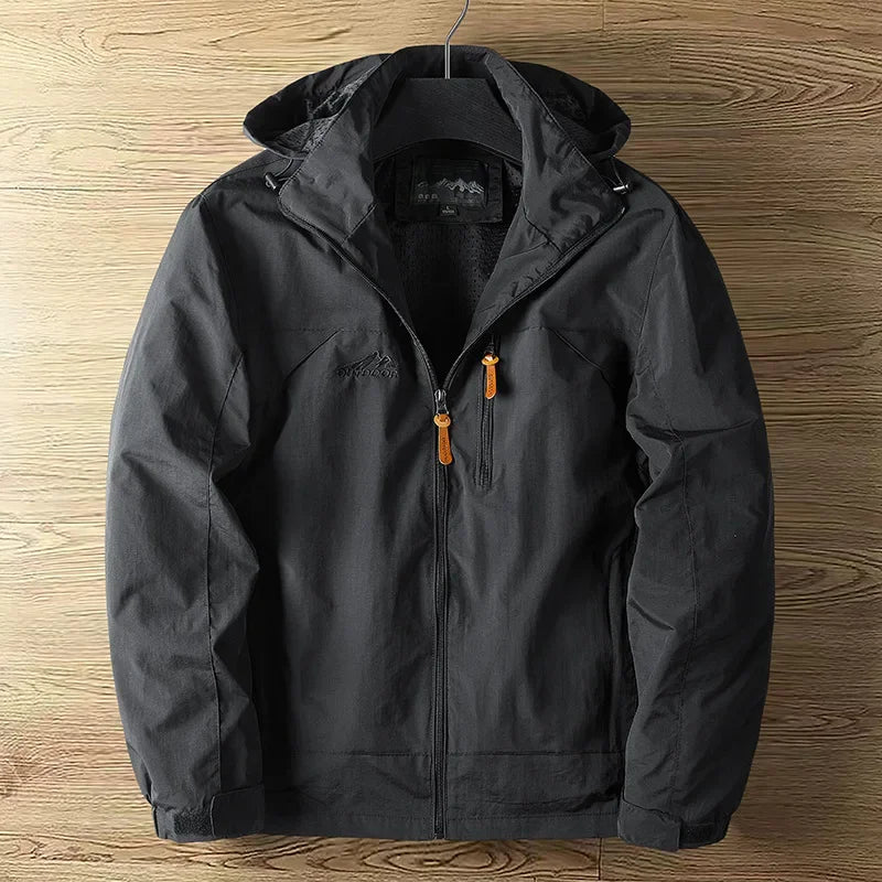 "Herren Outdoorjacke, wasserdicht, atmungsaktiv, in Blau, stilvolles Design, ideal für Wandern und Trekking."