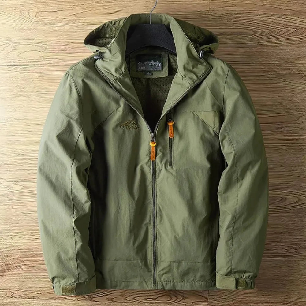 "Herren Outdoorjacke, wasserdicht, atmungsaktiv, in Blau, stilvolles Design, ideal für Wandern und Trekking."