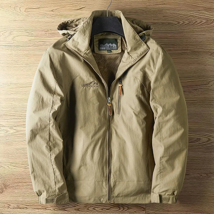 "Herren Outdoorjacke, wasserdicht, atmungsaktiv, in Blau, stilvolles Design, ideal für Wandern und Trekking."