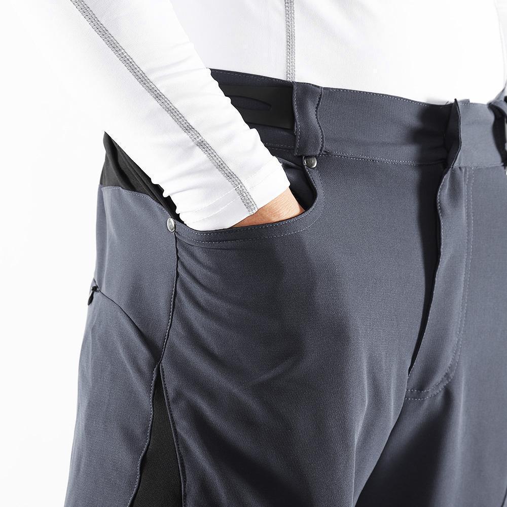 "Herren Radhose, atmungsaktiv, Dunkelblau, elastischer Bund, Reißverschlusstaschen, ideal für Outdoor-Radfahren."