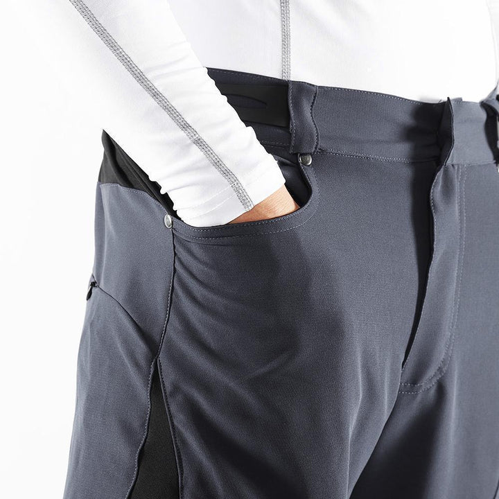 "Herren Radhose, atmungsaktiv, Dunkelblau, elastischer Bund, Reißverschlusstaschen, ideal für Outdoor-Radfahren."
