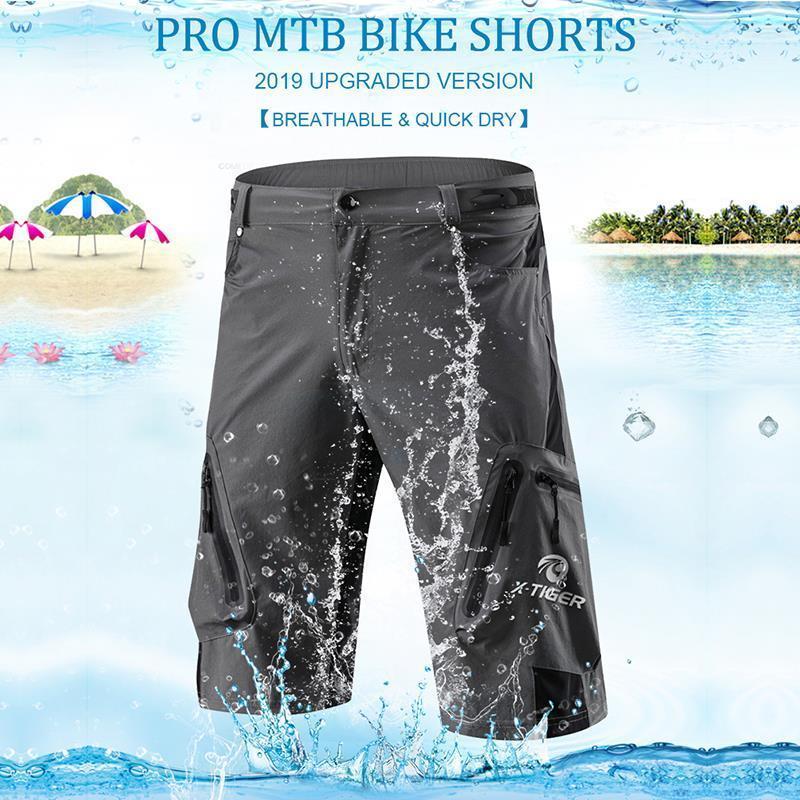 "Herren Radhose, atmungsaktiv, Dunkelblau, elastischer Bund, Reißverschlusstaschen, ideal für Outdoor-Radfahren."