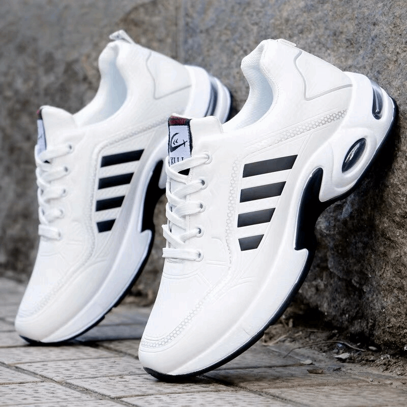 "Herren Sneaker, atmungsaktiv, orthopädisch, mit dämpfender Sohle, leichter Struktur, schwarz-graues Design."