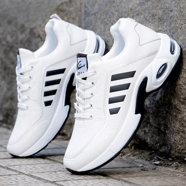 "Herren Sneaker, atmungsaktiv, orthopädisch, mit dämpfender Sohle, leichter Struktur, schwarz-graues Design."