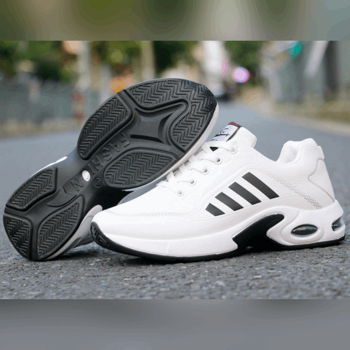 "Herren Sneaker, atmungsaktiv, orthopädisch, mit dämpfender Sohle, leichter Struktur, schwarz-graues Design."