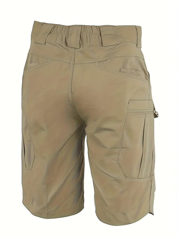 "Herrenshorts für Outdoor, robustes Design, mehrere Taschen, Regular Fit, 100% Polyester, ideal für Abenteuer."