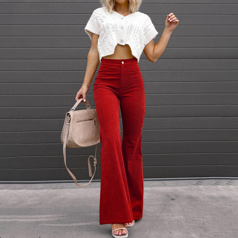 Hoch taillierte Schlaghose, ausgestelltes Bein, eleganter Retro-Stil, Damenmode, zeitloser Look, schmeichelhafte Passform