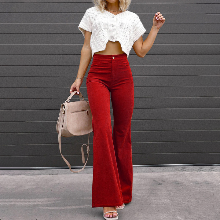 Hoch taillierte Schlaghose, ausgestelltes Bein, eleganter Retro-Stil, Damenmode, zeitloser Look, schmeichelhafte Passform
