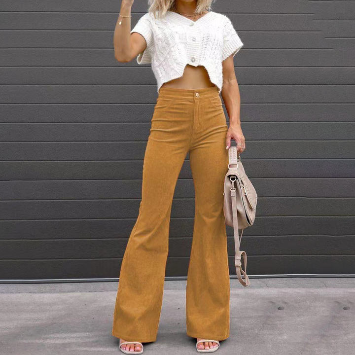 Hoch taillierte Schlaghose, ausgestelltes Bein, eleganter Retro-Stil, Damenmode, zeitloser Look, schmeichelhafte Passform