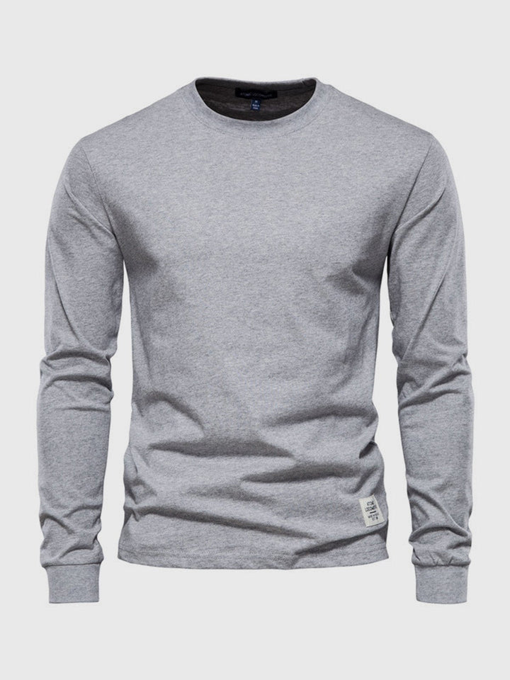"Hochwertiges Herren Langarmshirt aus Baumwolle mit Rundhalsausschnitt, zeitlose Passform, ideal für vielseitige Looks."