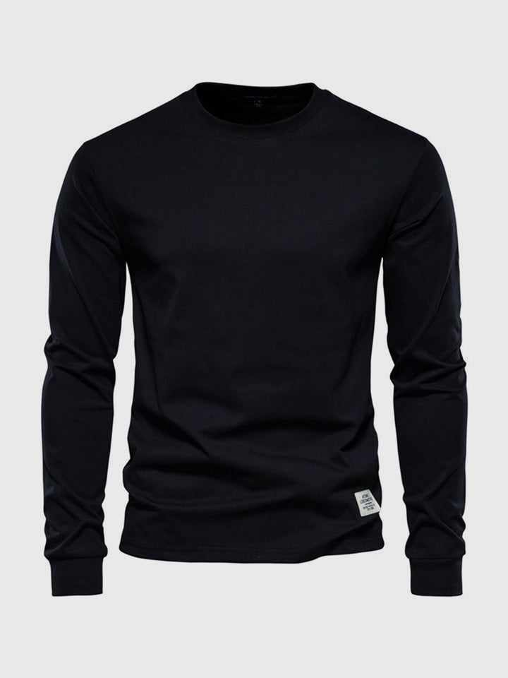 "Hochwertiges Herren Langarmshirt aus Baumwolle mit Rundhalsausschnitt, zeitlose Passform, ideal für vielseitige Looks."