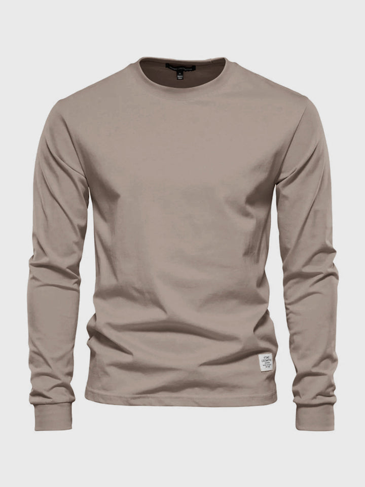 "Hochwertiges Herren Langarmshirt aus Baumwolle mit Rundhalsausschnitt, zeitlose Passform, ideal für vielseitige Looks."
