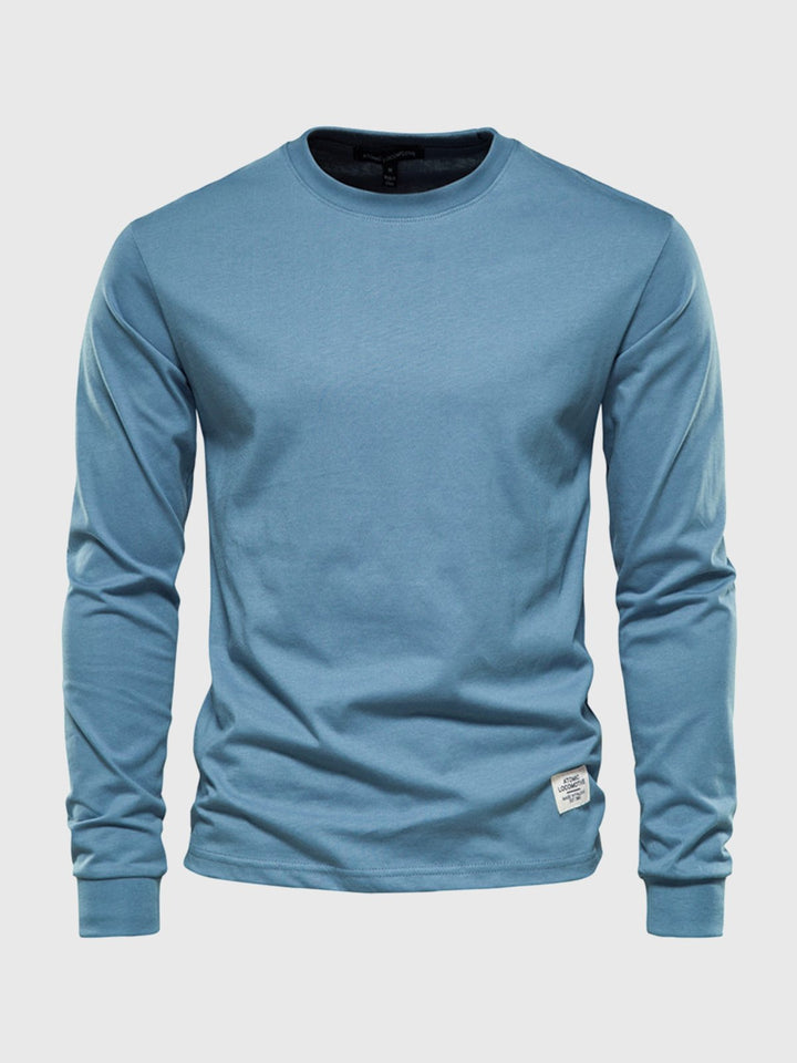 "Hochwertiges Herren Langarmshirt aus Baumwolle mit Rundhalsausschnitt, zeitlose Passform, ideal für vielseitige Looks."