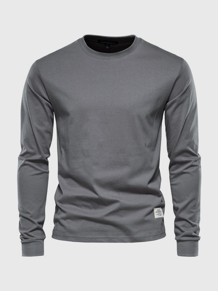 "Hochwertiges Herren Langarmshirt aus Baumwolle mit Rundhalsausschnitt, zeitlose Passform, ideal für vielseitige Looks."