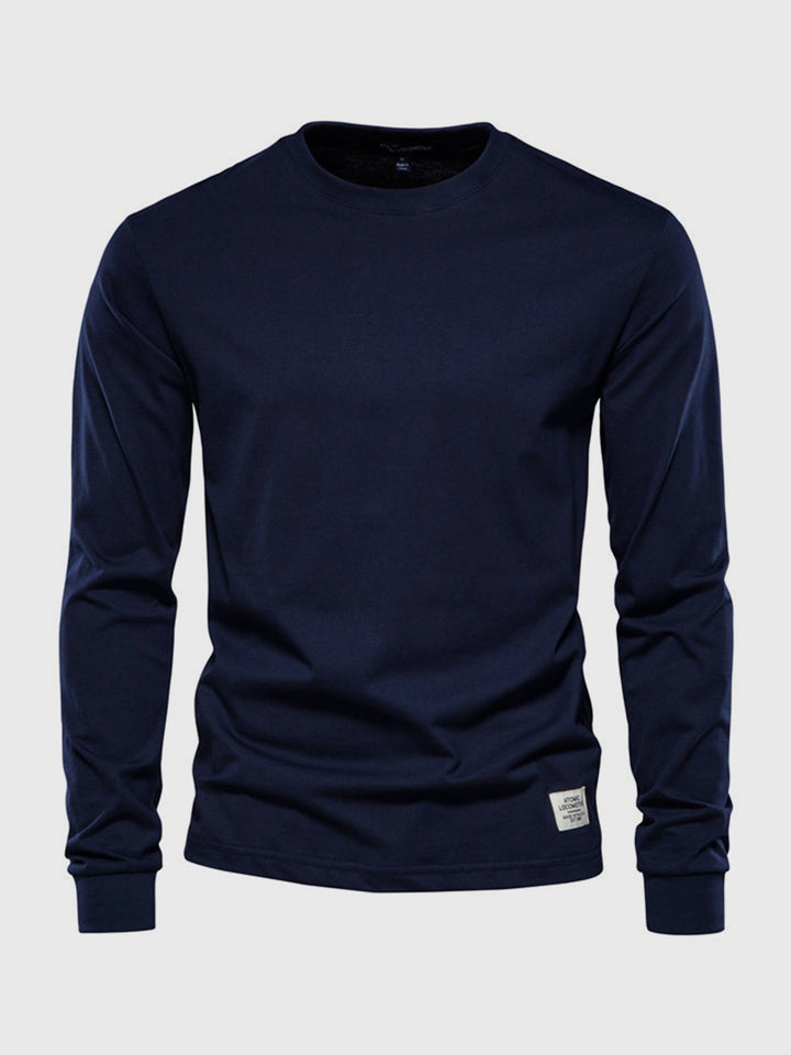 "Hochwertiges Herren Langarmshirt aus Baumwolle mit Rundhalsausschnitt, zeitlose Passform, ideal für vielseitige Looks."