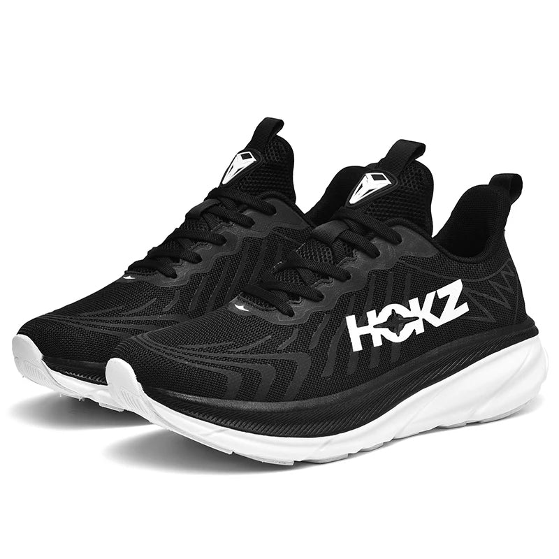 Schwarze HOKZ Trainingsschuhe, atmungsaktiv, mit weißer Sohle, ideal für Sport und Fitness.