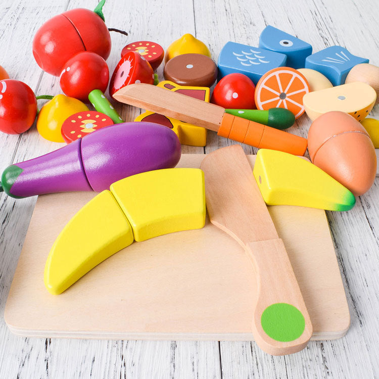 "Holz Montessori Schneide Spielset mit buntem Holz-Obst und -Gemüse, geeignet für kreatives Lernen und kleine Kinderhände."