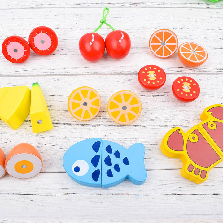 "Holz Montessori Schneide Spielset mit buntem Holz-Obst und -Gemüse, geeignet für kreatives Lernen und kleine Kinderhände."