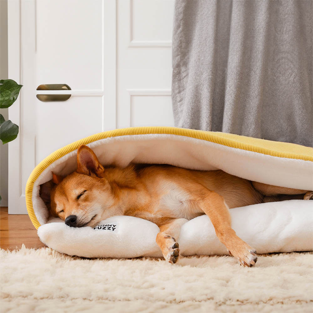 Hundebett mit Schlafsackdesign, weiches Kaninchenfellfutter, ideal für Welpen und kleine Hunde, luxuriöse Geborgenheit.