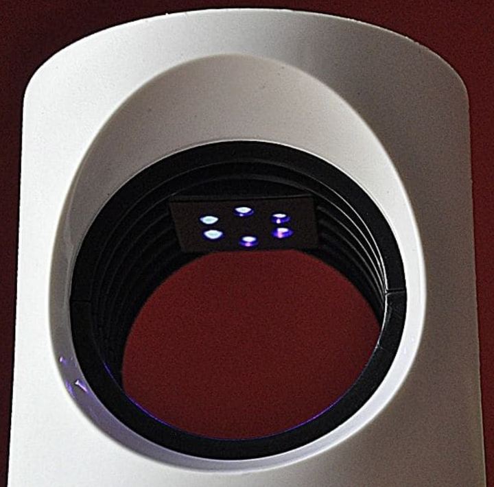 "Innovative Insektenfalle mit lila Licht und Ventilator, sicher und umweltfreundlich, ideal für effektiven Mückenschutz."